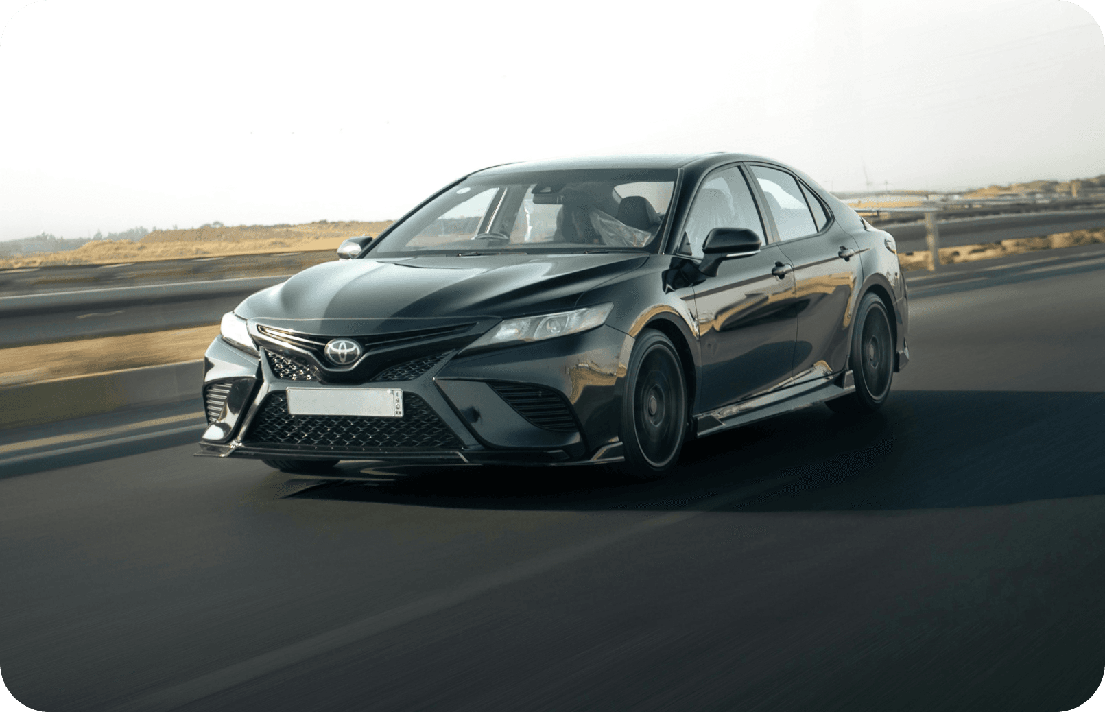 Hand holding car keys